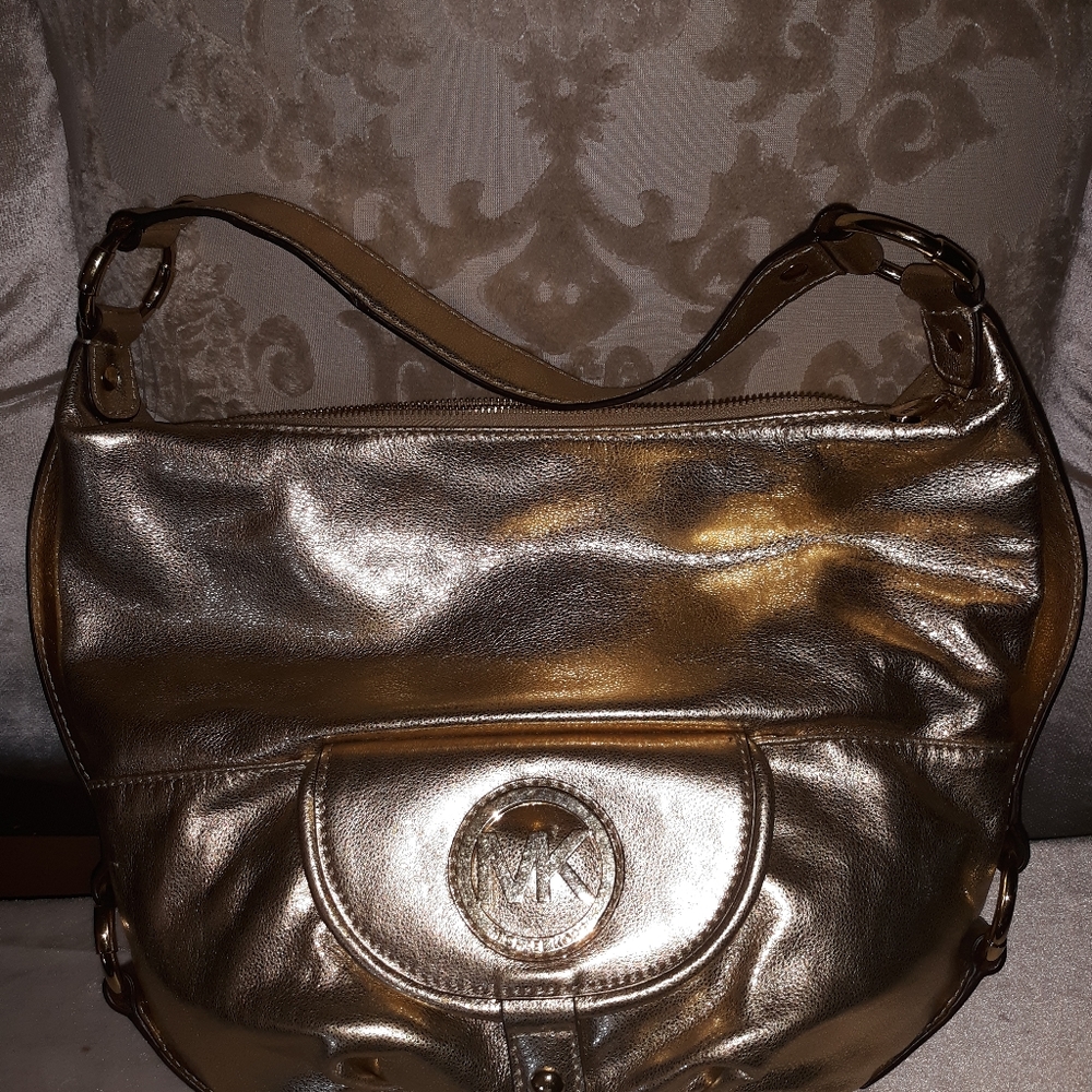 Michael Kors gold leather purse new with tags